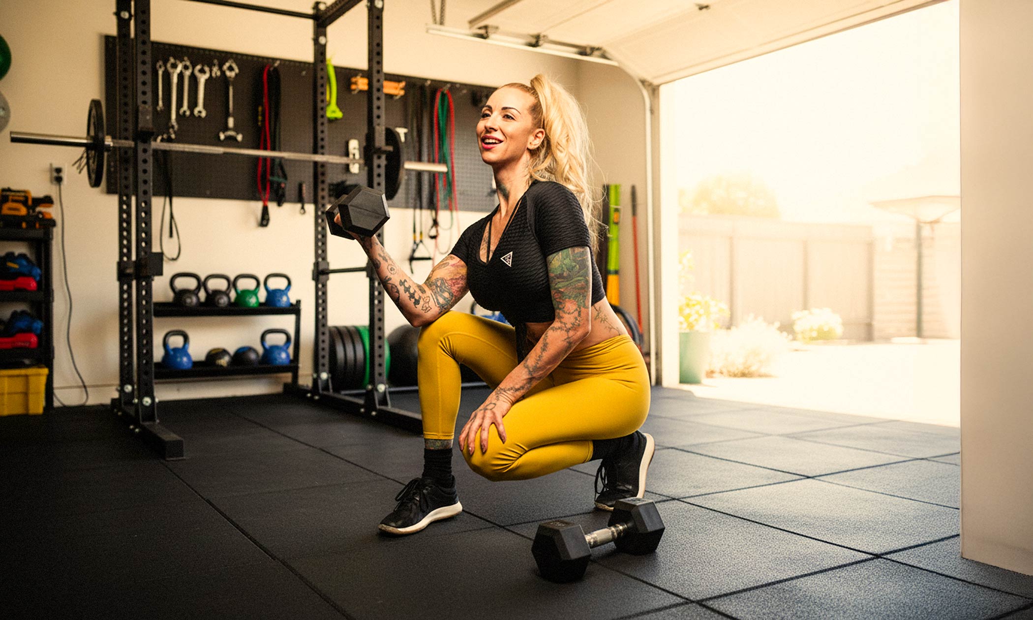 Jaime Leona in a dramatic fitness portrait with purple lighting